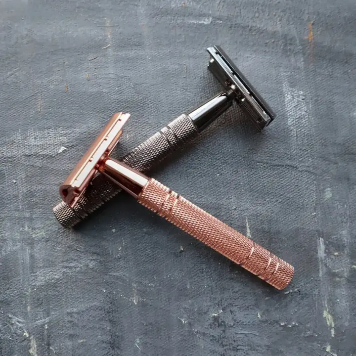 rose gold and metallic black safety razor for eco friendly shaving.