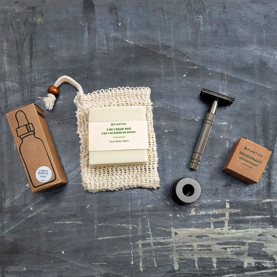 Give your dad the gift of exceptional grooming with our Father's Day Bundle Option 1 - Moisturizing Beard Oil, 3-in-1 Soap Bar, Soap Bag, Metallic Black Safety Razor Kit and Zero Waste Deodorant Bar - Unscented.