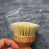 Biodegradable handle houses flexible bristles to hygienically cleanse all surfaces naturally.