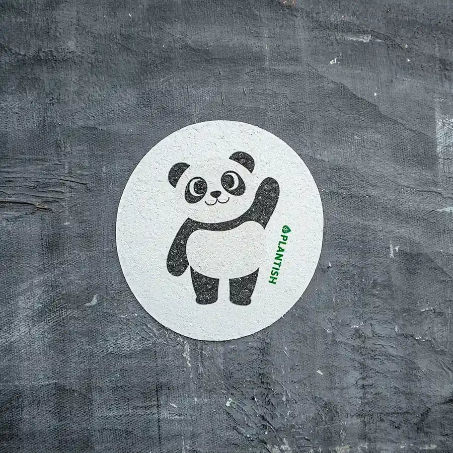 Zero waste, reusable, biodegradable panda pop-up sponge for kitchen cleaning.