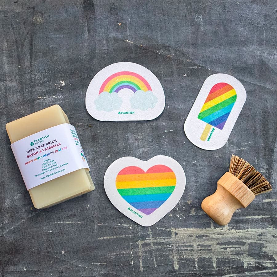 The Solid Dish Soap Pride Sponge Set combines functionality and inclusivity for an exceptional dishwashing experience. This set includes a variety of products designed to make dishwashing effective, sustainable, and colorful Option 1 - Minty Mint Dish Soap Brick, Pride Rainbow Heart Pop-Up Sponge, Pride Rainbow Popiscle Pop-Up Sponge, Pride Rainbow Heart Pop-Up Sponge and our Pot Scrubber.