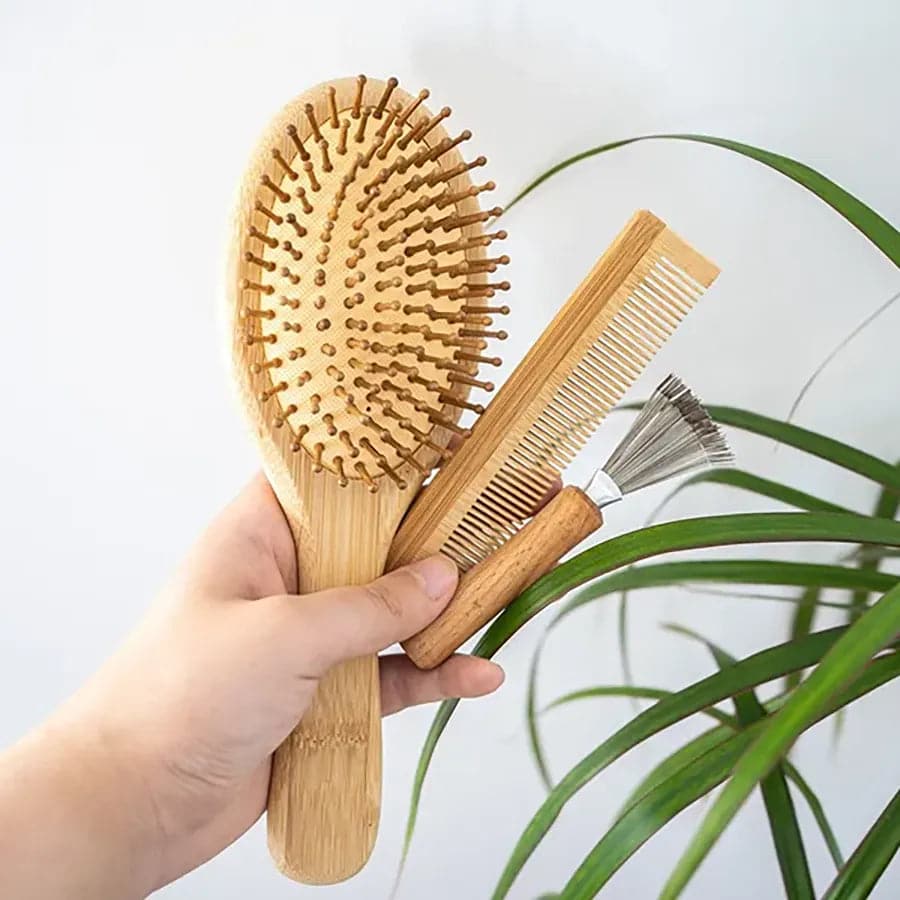 Set of wooden brushes. Wooden brush, wooden comb and wood handle brush cleaner.