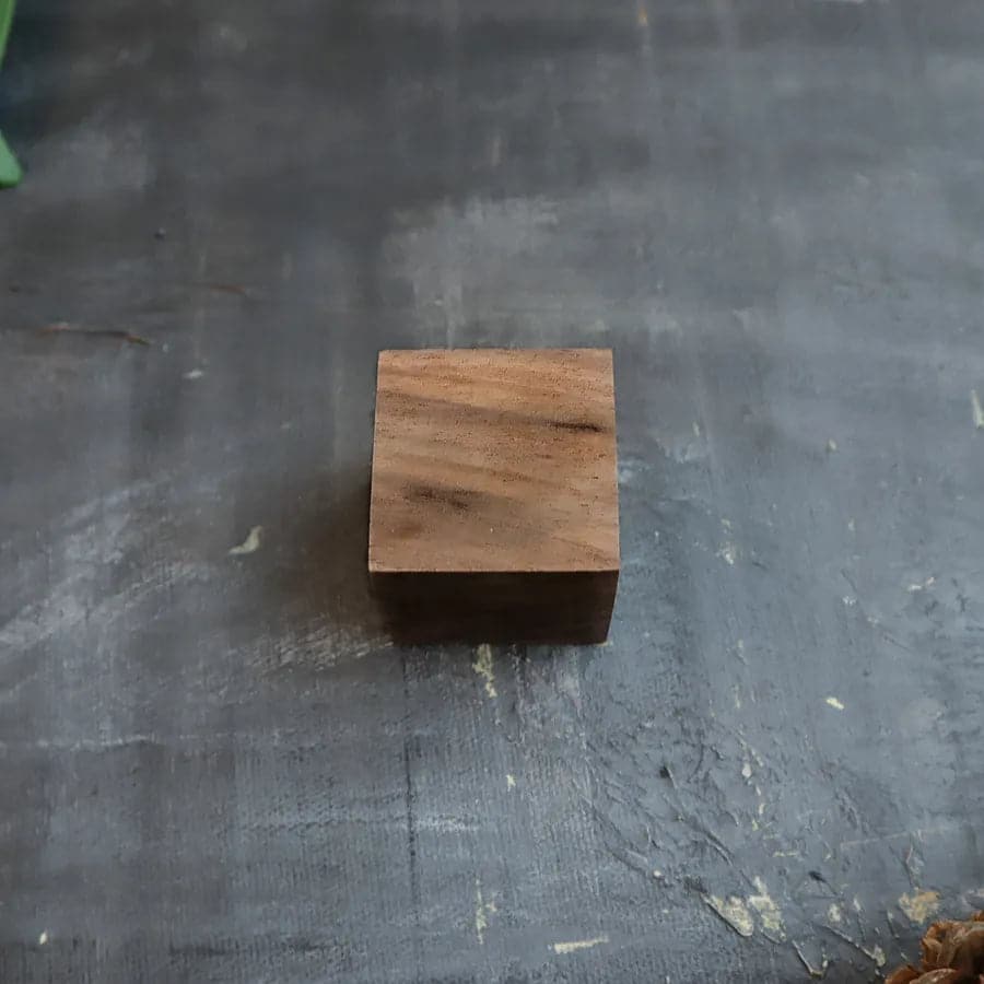 Bottom view of square wooden essential oil diffuser.