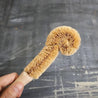 Plastic free and eco friendly coconut bottle brush with coconut fiber bristles.