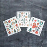 Holly jolly set of 3 Swedish sponge cloths with festive holiday patterns.