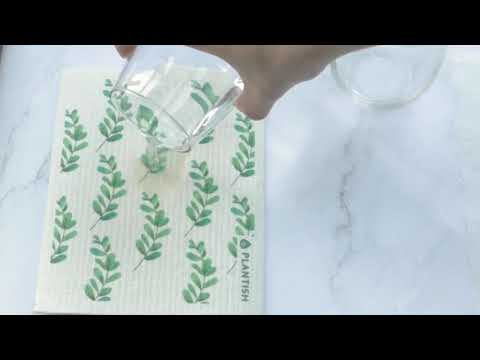 Video of Swedish sponge cloth and paper towels absorbing water. Kitchen cleaning alternative. plastic free and eco friendly.