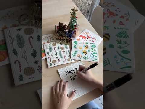 Video using holiday Swedish sponge cloths as holiday greeting card, kitchen decor and kitchen cleaning for accidental spills.