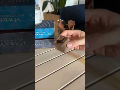 Video of how to use essential oil inside square wooden diffuser and waving it in the air.