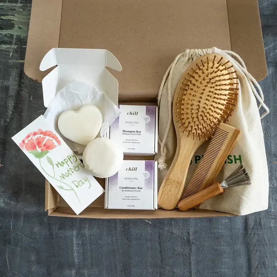 Hydrating shampoo and conditioner bar with bamboo brush set.