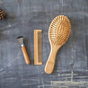 Bamboo brush set for your eco friendly hair care routine. Designed with wooden bristles to detangle and smoothen hair.