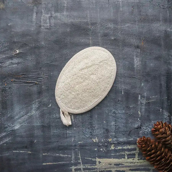 Natural loofah sponge for exfoliating and cleansing skin.