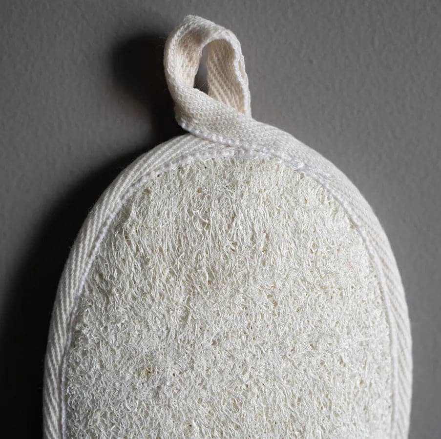 Loofah shower sponge for cleaning and exfoliating the skin.