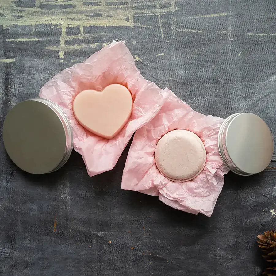 Nourishing shampoo and conditioner bar in metal tins. Eco friendly and zero waste.