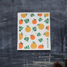 Orange reusable Swedish dishcloth for kitchen cleaning.