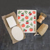Peach reusable Swedish dishcloth with sisal and palm pot scrubber, loofah and solid dish soap brick. Great plastic free, eco friendly kitchen cleaning tools.