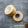 Two rolls of eco friendly kraft paper tape for zero waste packaging.