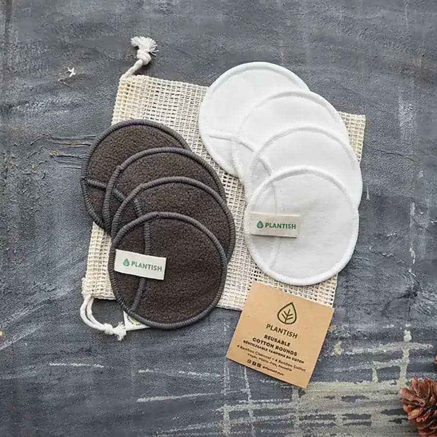 4 bamboo charcoal reusable cotton rounds and 4 white reusable cotton rounds with mini mesh bag.