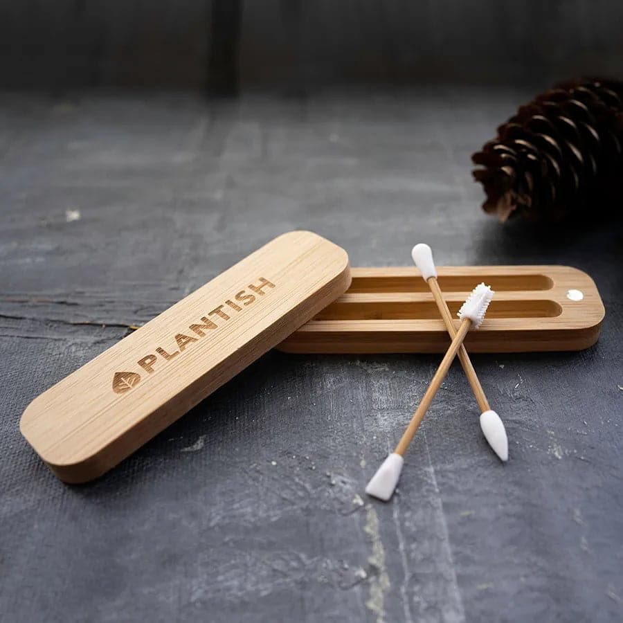 Silicone reusable cotton swabs or q tips in a natural bamboo case for travel.