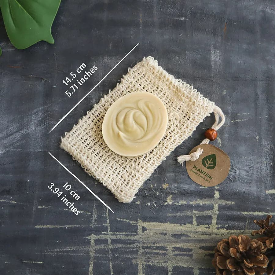 Dimensions of loofah soap bag with soap bar. 14.5 centimetres by 10 centimetres.