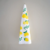 Lemon Swedish tea towel hanging on hook.