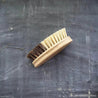 Side view of kitchen dish brush. Eco friendly and plastic free dish brush.