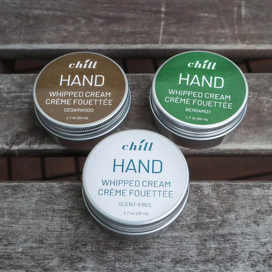 Different fragrance whipped hand cream in metal tins. Cedarwood, bergamot, scent-free.