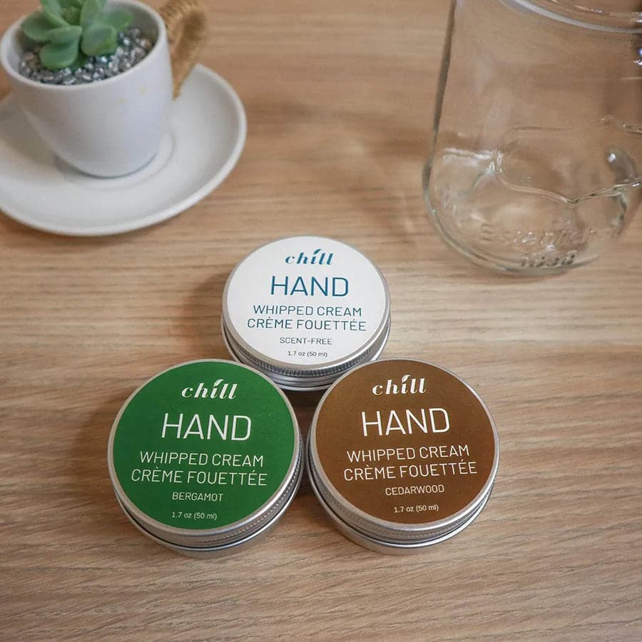 Different fragrance whipped hand cream in metal tins. Cedarwood, bergamot, scent-free.